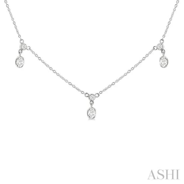 5/8 ctw Dangle Oval and Round Cut Diamond Station Necklace in 14K White Gold