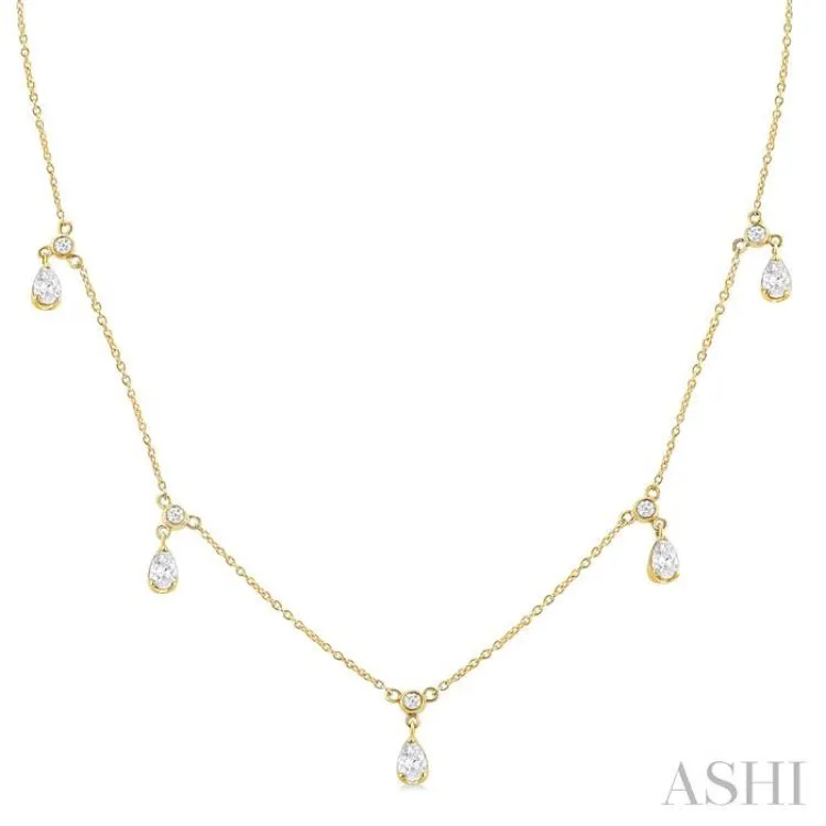 5/8 ctw Dangle Pear and Round Cut Diamond Station Necklace in 14K Yellow Gold
