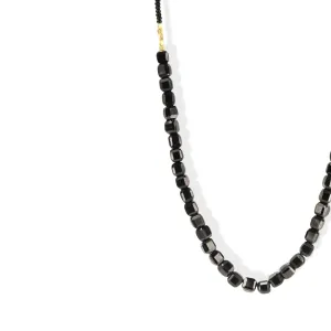 Black Seed Necklace with Gold Vermeil and Black Onyx Beads in Center