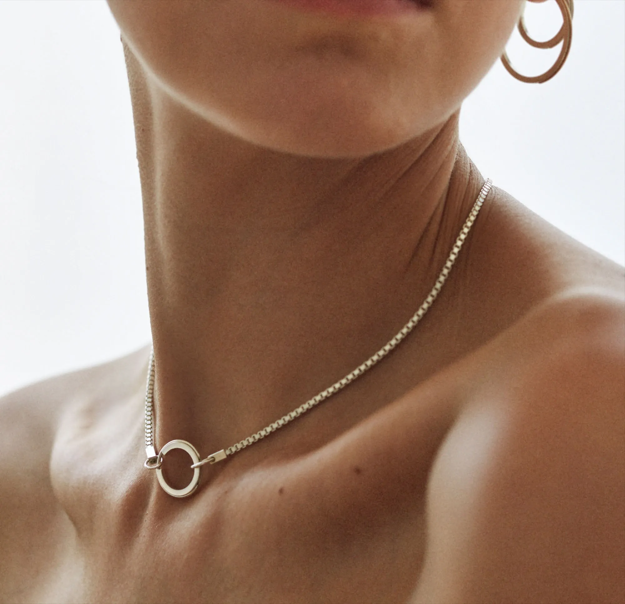 CO hoop earring