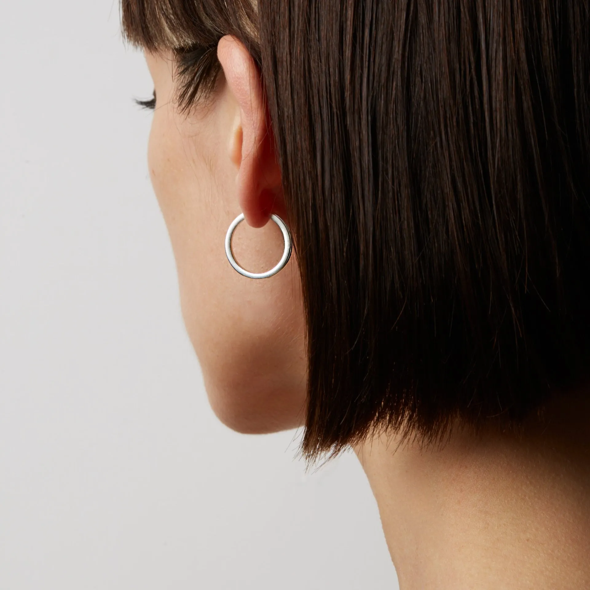 CO hoop earring