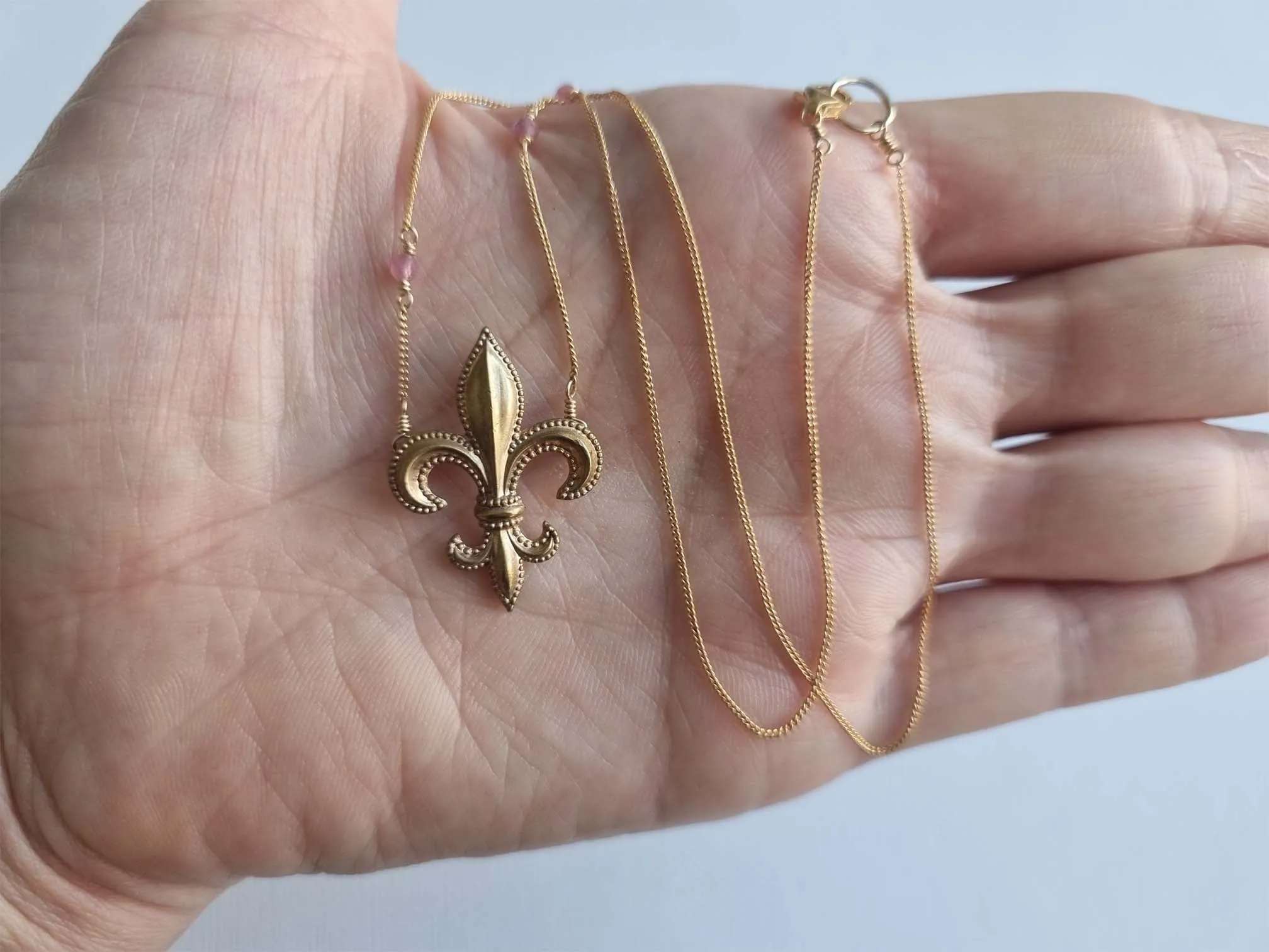 fleur de lis | antique brooch pink sapphire necklace