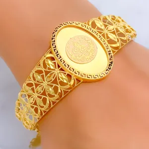 Glistening Tapered Oval 21K Gold Flexi Bangle Bracelet