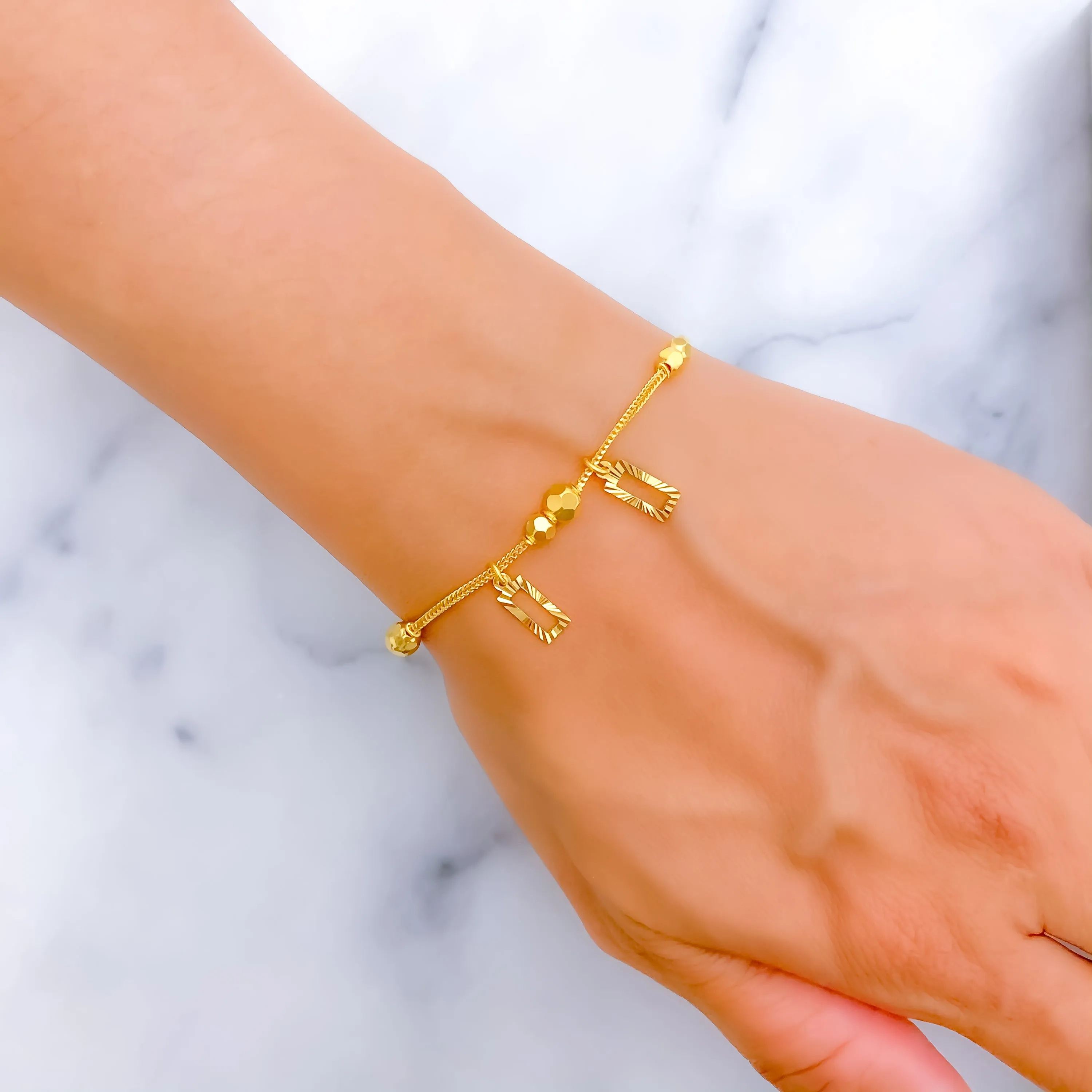 Jazzy Decorative 22k Gold Charm Bracelet