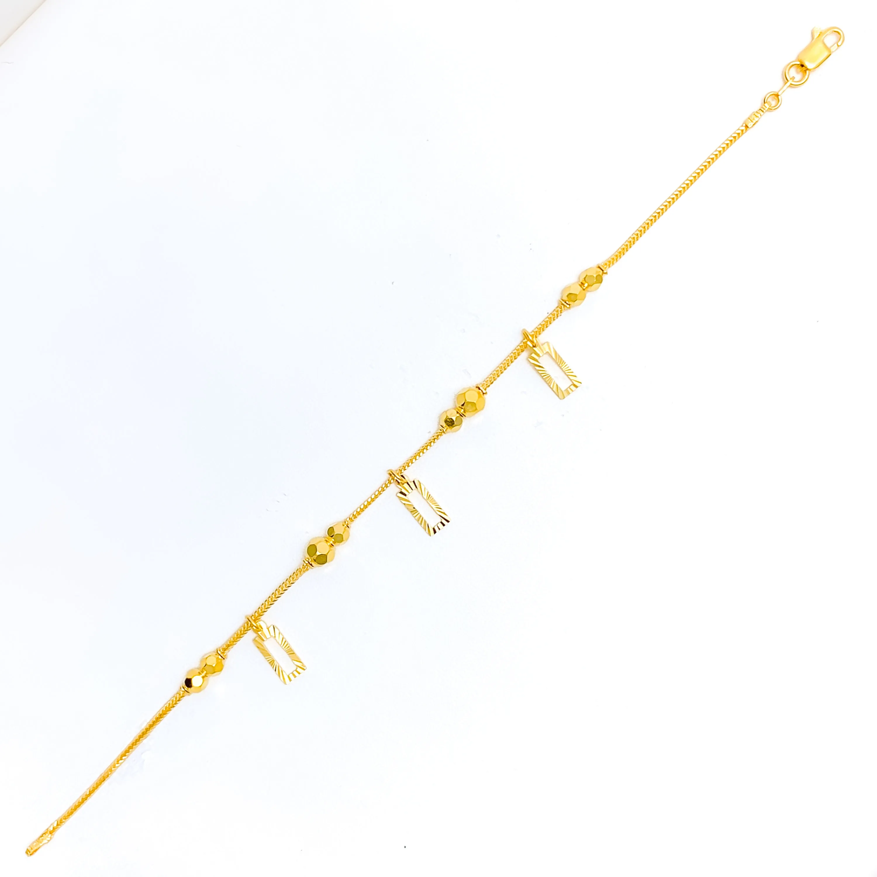Jazzy Decorative 22k Gold Charm Bracelet