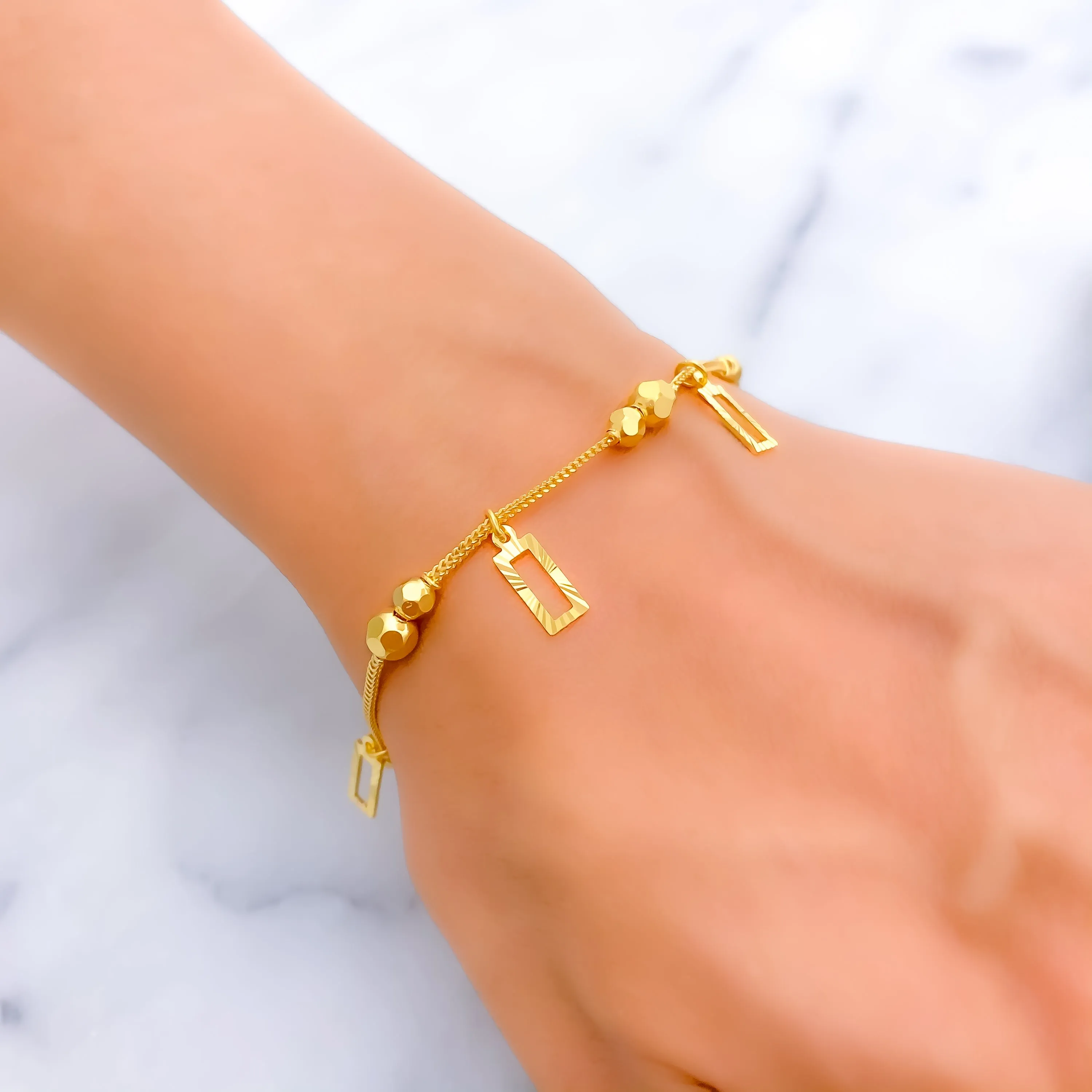 Jazzy Decorative 22k Gold Charm Bracelet