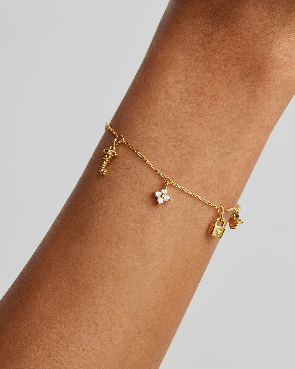 Love Unlocked Charm Bracelet - Gold