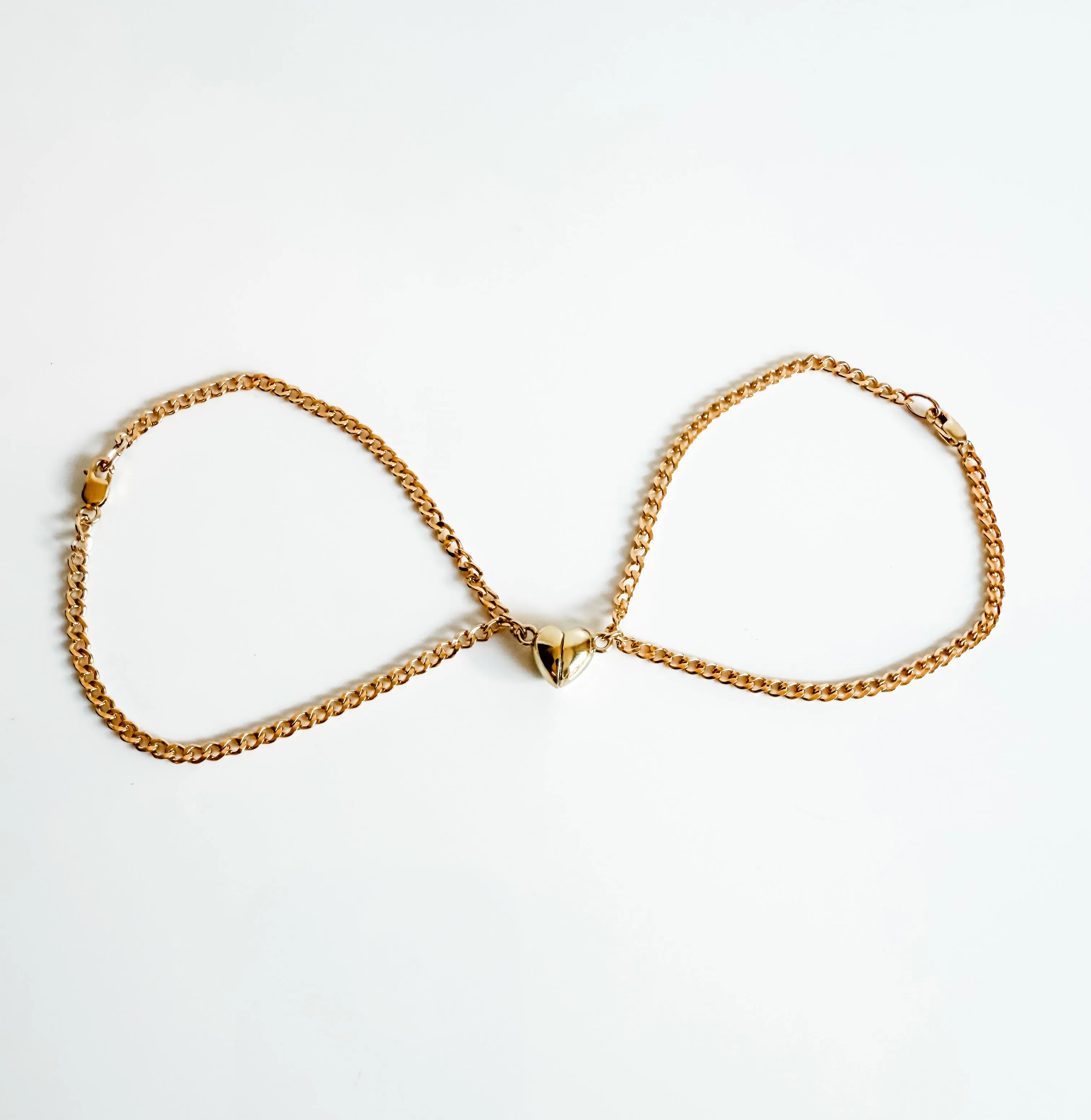 Magnetic heart charm bracelets