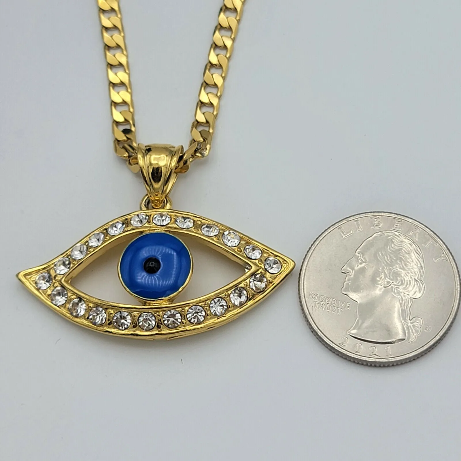Necklaces - 24K Gold Plated. Blue Eye Crystal Pendant & Chain. Clear Crystals.
