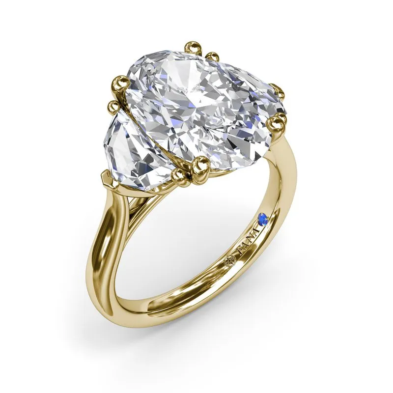 Three Stone Oval and Cadillac Engagement Ring